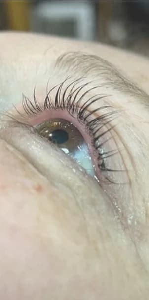 After: One eye looking up, before and after a lash lift