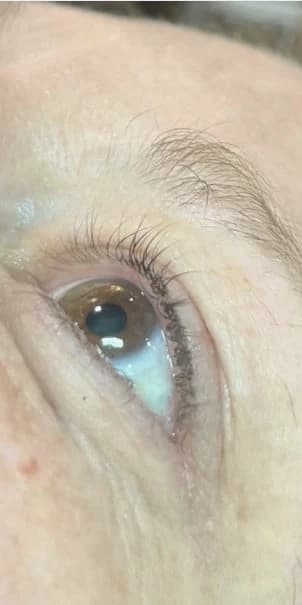 Before: One eye looking up, before and after a lash lift